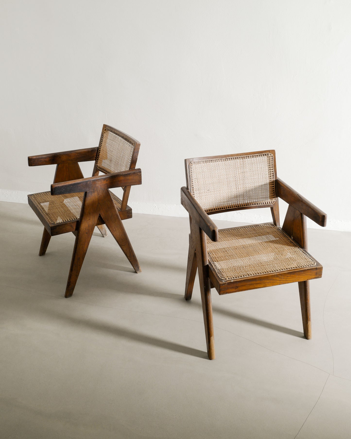 PAIR OF PIERRE JEANNERET OFFICE CHAIRS, 1950s