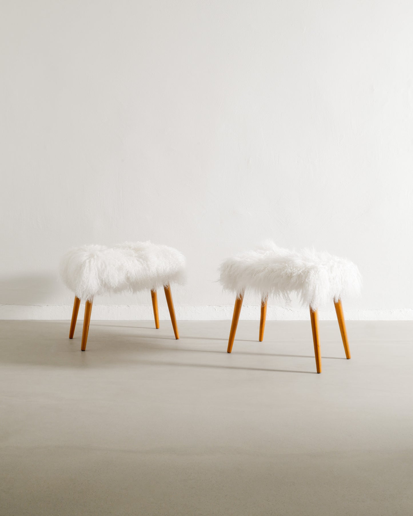 PAIR OF SWEDISH BEECH STOOLS WITH SHEEPSKIN