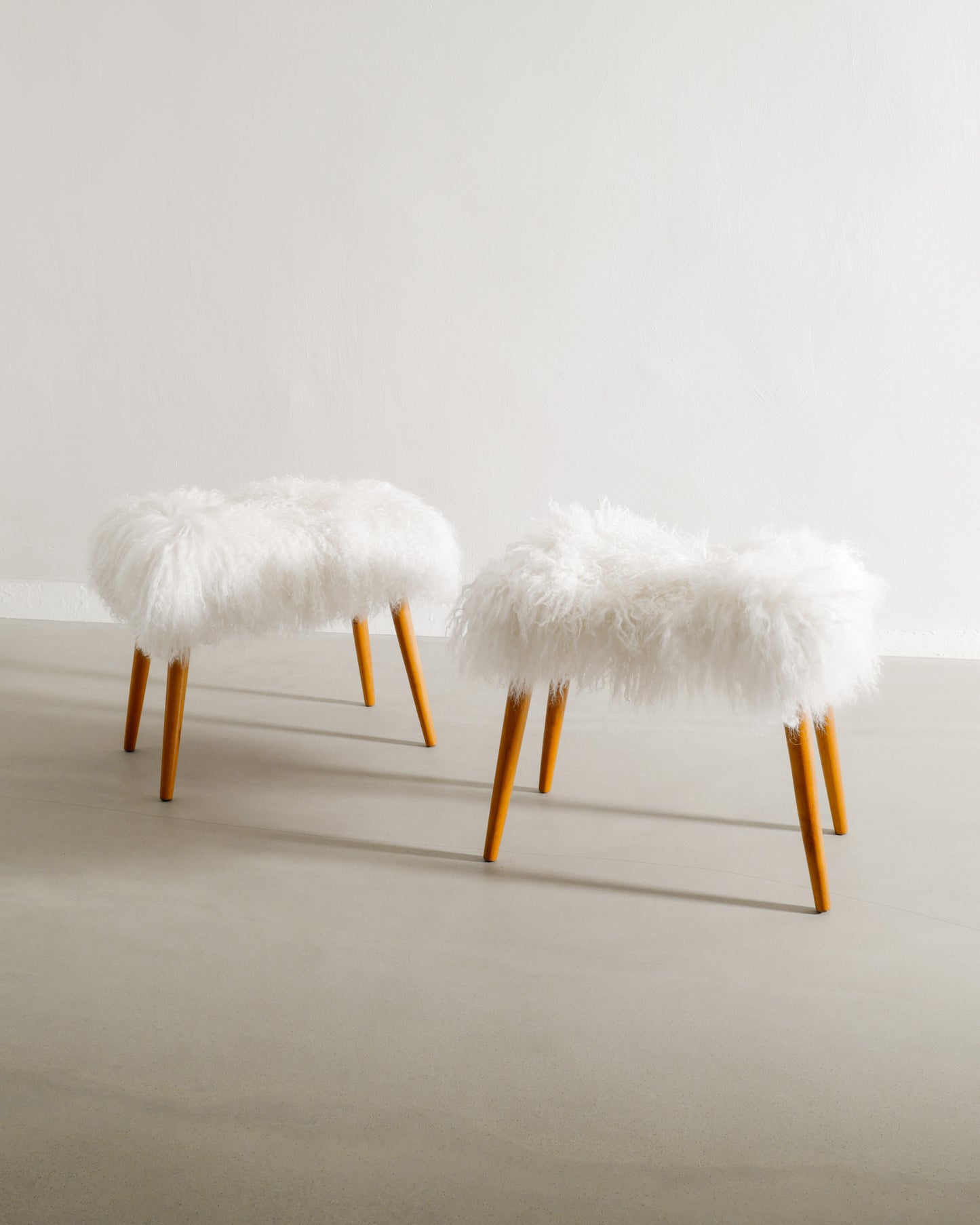 PAIR OF SWEDISH BEECH STOOLS WITH SHEEPSKIN