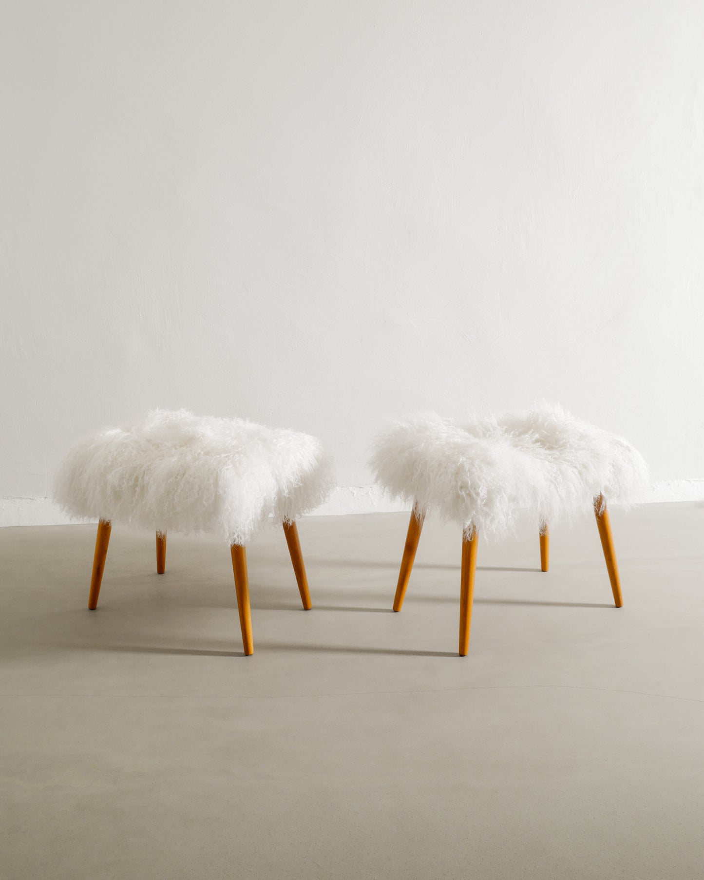 PAIR OF SWEDISH BEECH STOOLS WITH SHEEPSKIN